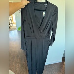 NWT Express black silky women’s jumpsuit size Medium